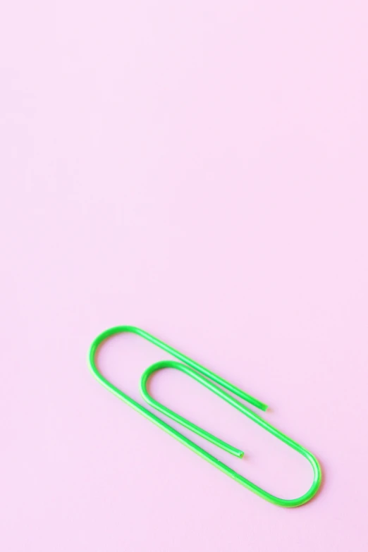 a green paper clip on a pink background, by Jessie Algie, trending on pexels, postminimalism, black fork, 15081959 21121991 01012000 4k, hot neon green ornaments, curves