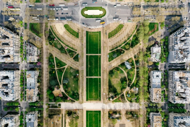 an aerial view of the eiffel tower in paris, a photo, by Raphaël Collin, unsplash contest winner, art nouveau, lawn, symmetrically, in a square, viktoria gavrilenko