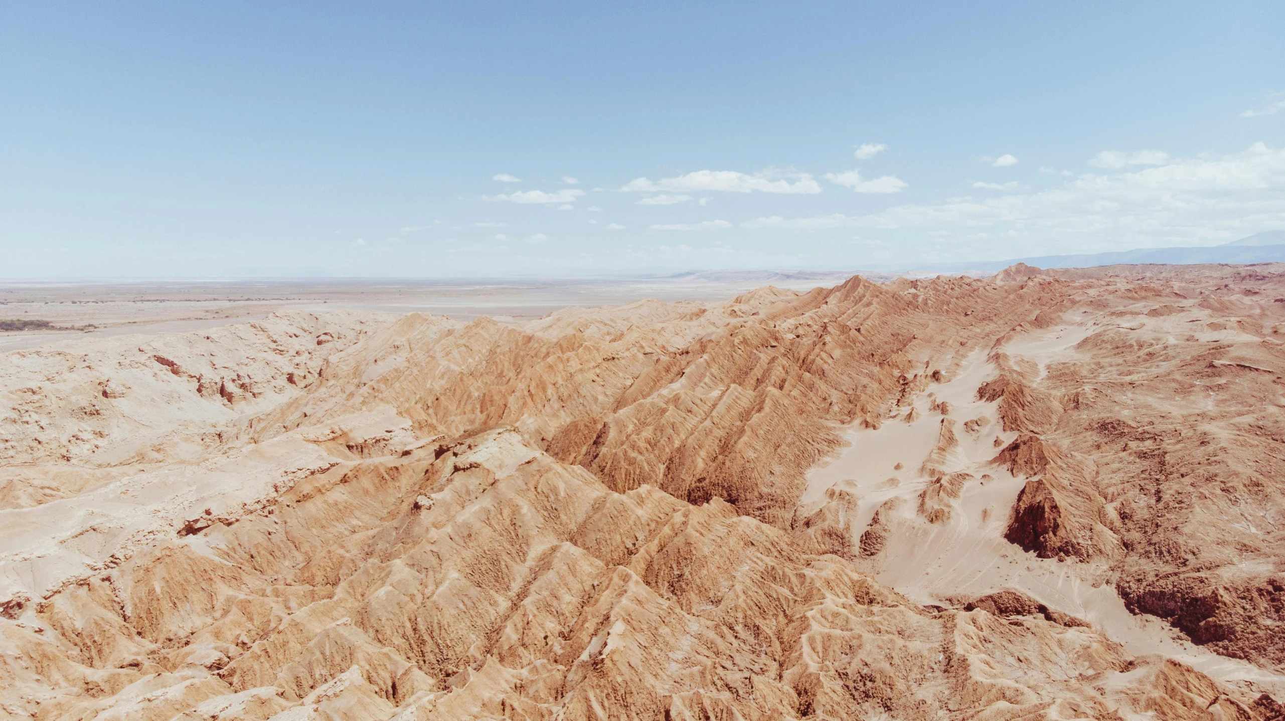 a man flying through the air while riding a skateboard, trending on unsplash, les nabis, rocky desert, 4 k cinematic panoramic view, in chuquicamata, erosion