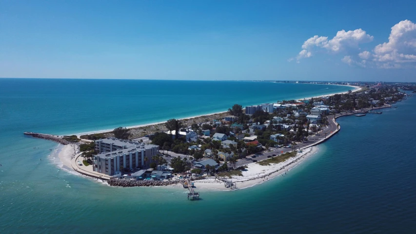 an island in the middle of the ocean, by Ryan Pancoast, pexels contest winner, kicking a florida mansion, whitewashed buildings, beachfront, tyler west