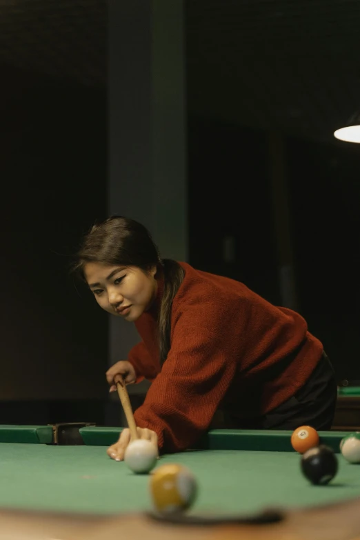 a woman is playing a game of pool, inspired by Zhou Wenjing, shin hanga, 1990s photograph, rectangle, full frame image