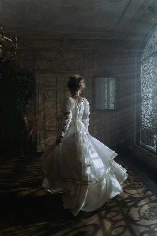 a woman in a white dress standing in front of a window, inspired by James Tissot, pexels contest winner, rococo, ;cinematic lighting, walking towards the camera, ( ( theatrical ) ), full dress