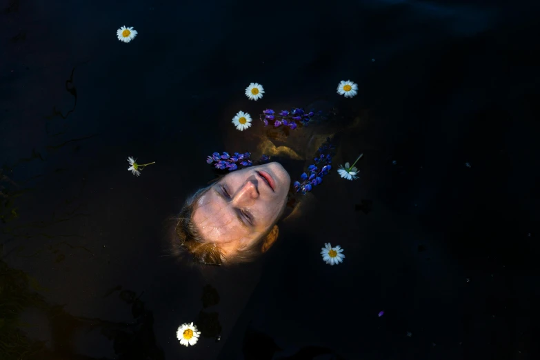 a person floating in a body of water surrounded by flowers, by Eglon van der Neer, pexels contest winner, hyperrealism, ((portrait)), low light, in lake, kirsi salonen