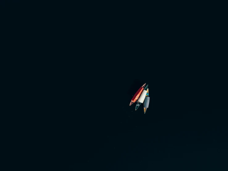 a man riding a surfboard on top of a wave, an album cover, by Jan Rustem, unsplash, minimalism, spaceship in dark space, !dream abandoned rocket ship, hd phone wallpaper, dark blue and red