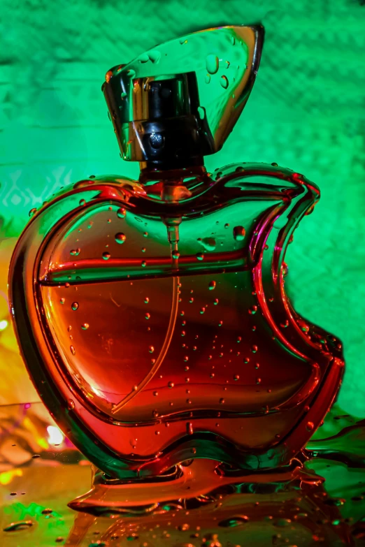 a bottle of perfume sitting on top of a table, inspired by Jeff Koons, pexels contest winner, apple logo, syrup, holiday season, profile image