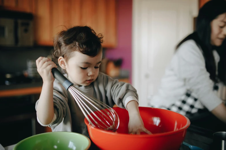 a little boy holding a whisk in a red bowl, pexels, gif, profile image, 1 2 9 7, mixing