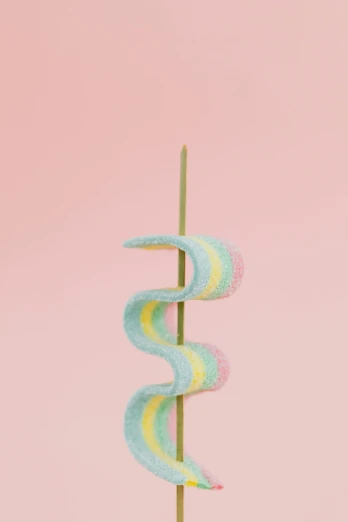 a close up of a toothpick on a stick, by Peter Alexander Hay, pastel cute slime, mixed with snake, 🍸🍋