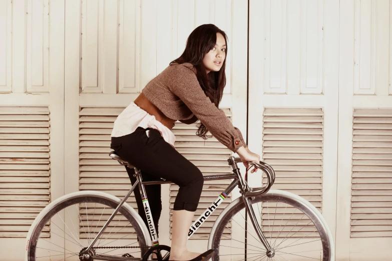 a woman that is sitting on a bike, profile image, posing for camera, longque chen, sweat