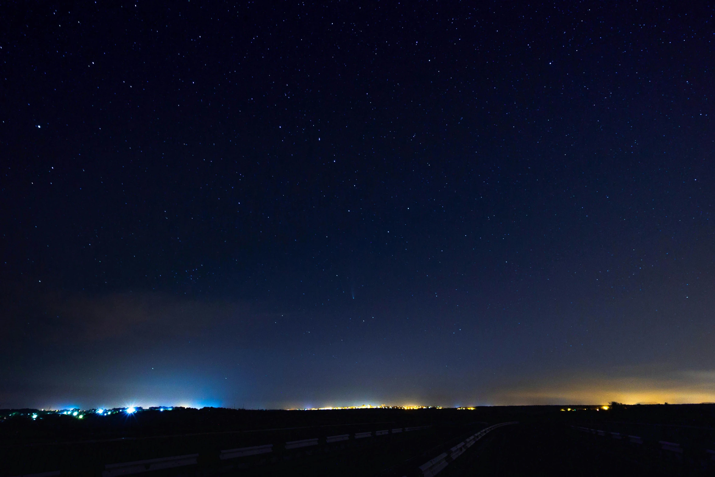 a night sky filled with lots of stars, pexels contest winner, distant town lights, wide horizon, blue and clear sky, iso 1 0 0 wide view