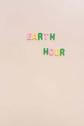 a white refrigerator with the words earth hour written on it, an album cover, inspired by Edward Ruscha, tumblr, earth and pastel colors, earring, day time, neon aesthetic