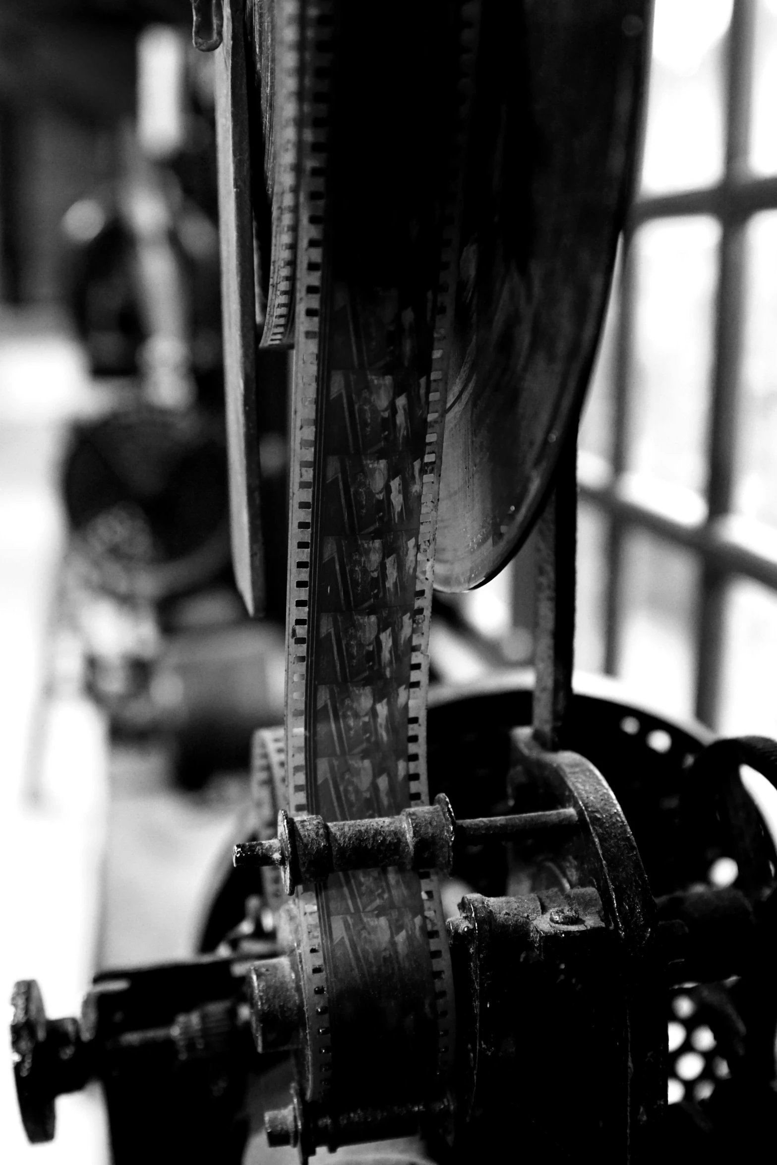 a machine that is sitting in front of a window, a black and white photo, flickr, cinestill!