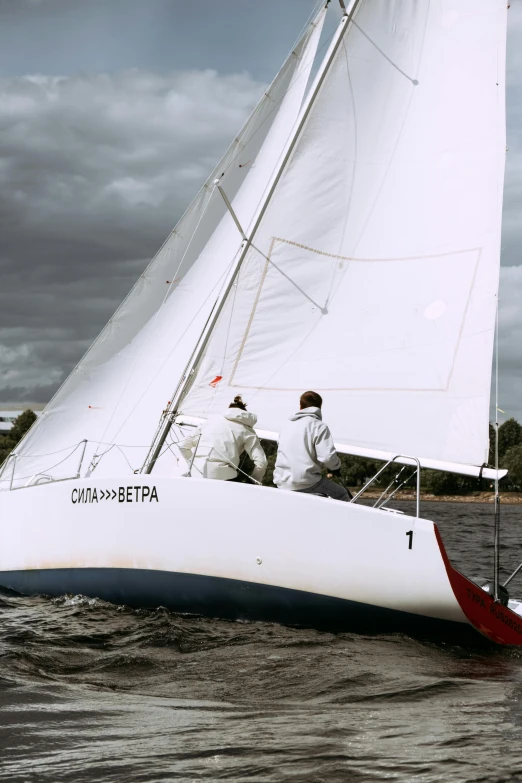 a couple of men riding on the back of a sailboat, an album cover, by Ilya Ostroukhov, unsplash, gutai group, racing, white, grey, moored