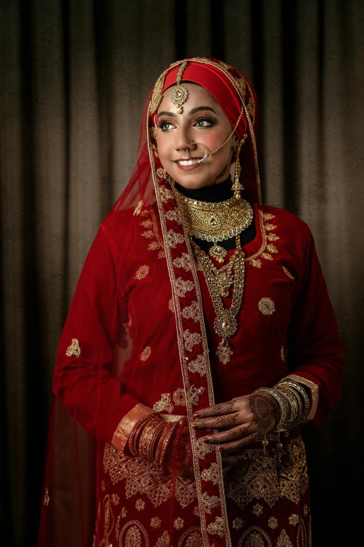 a woman in a red outfit posing for a picture, a portrait, inspired by Steve McCurry, hurufiyya, wedding, high resolution image, front portrait, malaysian