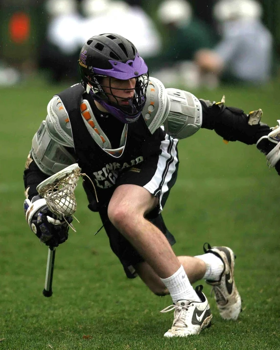 a lacrosse player in action on the field, by Jacob Burck, purple and black, smirking, imgur, taken in the 2000s