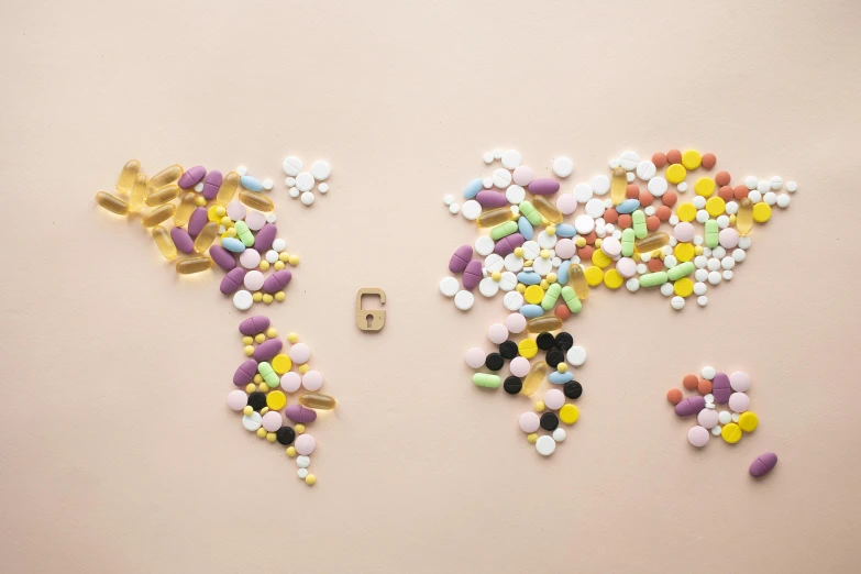 a map of the world made out of pills, trending on pexels, international typographic style, candy treatments, 1024x1024, medical labels, light and dark