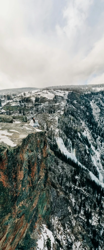 a man flying through the air while riding a snowboard, a tilt shift photo, pexels contest winner, les nabis, the village on the cliff, spring winter nature melted snow, unsplash 4k, view from helicopter