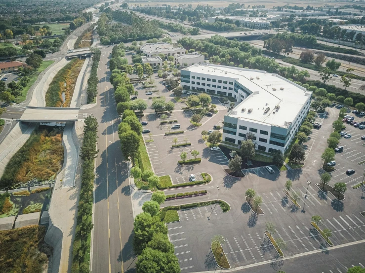 an aerial view of a large parking lot, renaissance, office building, bay area, background image, ultrastation hq