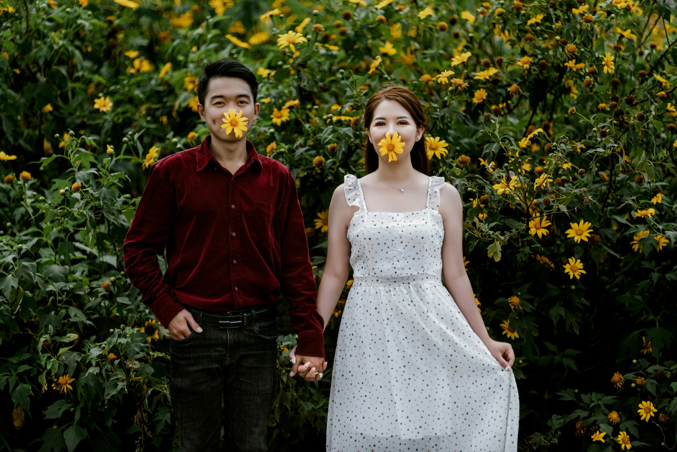 a man and a woman standing next to each other, a picture, pexels, realism, with yellow flowers around it, hoang long ly, avatar image, modeling photography