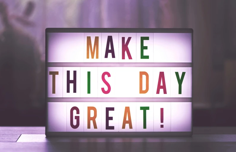 a sign that says make this day great, a picture, by Paul Bird, shutterstock, led display, purple, instagram post, multicoloured