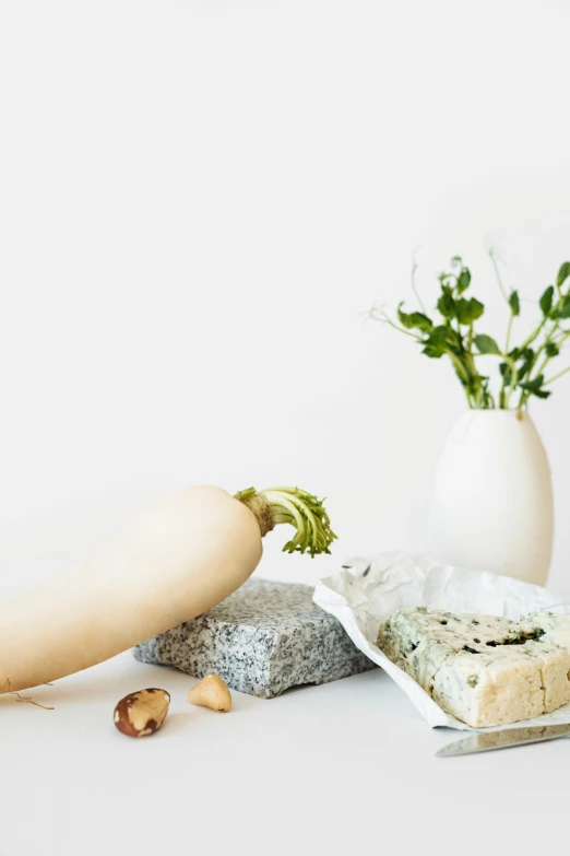 a bunch of food sitting on top of a table, a still life, inspired by Sarah Lucas, unsplash, conceptual art, limestone, cheese, white background, background image