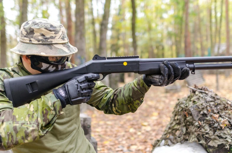 a man in camouflage holding a rifle in the woods, muzzle flash, profile image, thumbnail, airsoft cqb