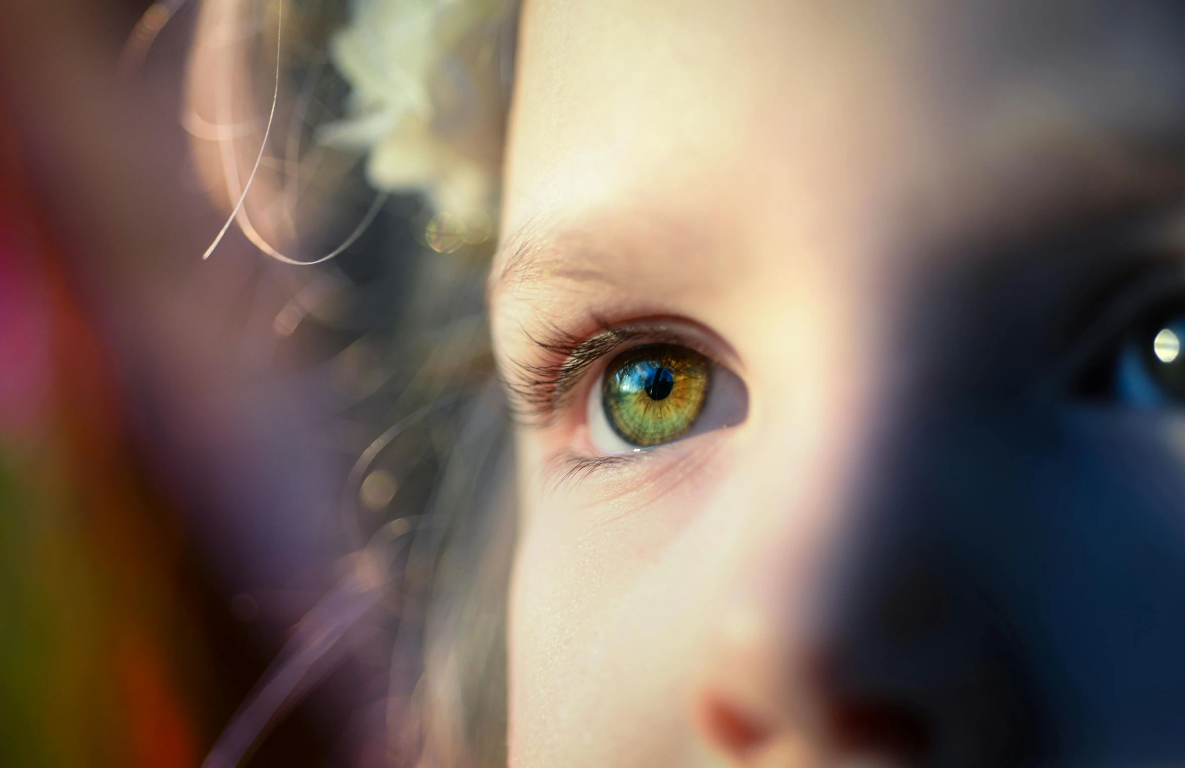 a close up of a child's green eyes, a picture, by Adam Marczyński, pexels contest winner, iridescent eyes, soft light from the side, eyes are yellow, post processed