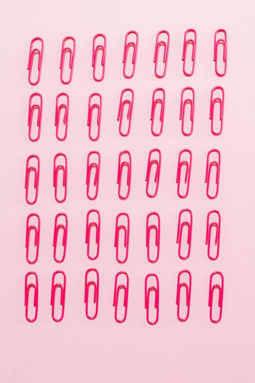 a bunch of pink clips sitting on top of a pink surface, a silk screen, by Jacob Toorenvliet, pexels, thin red lines, pinterest wallpaper, 3 2 x 3 2, planner stickers