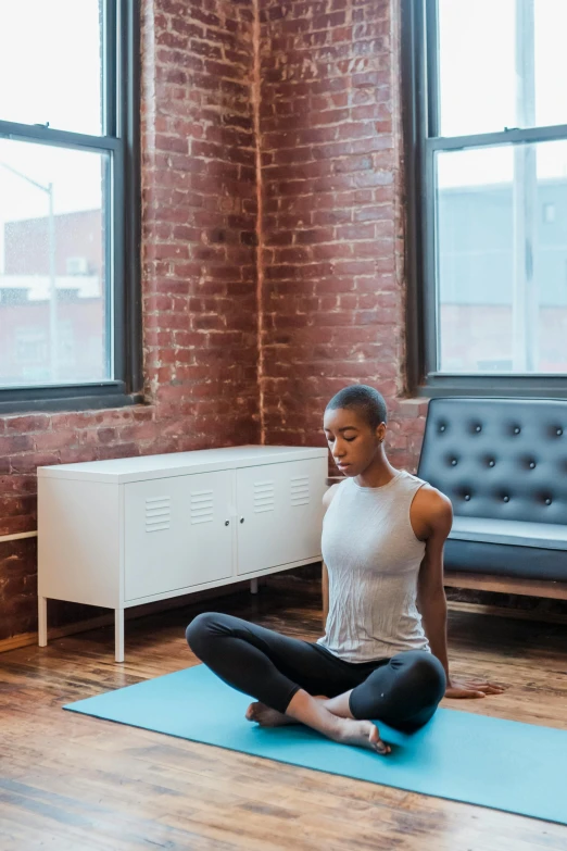 a woman sitting on a yoga mat in a living room, by Carey Morris, trending on unsplash, renaissance, promo image, washington dc, full body 8k, instagram story