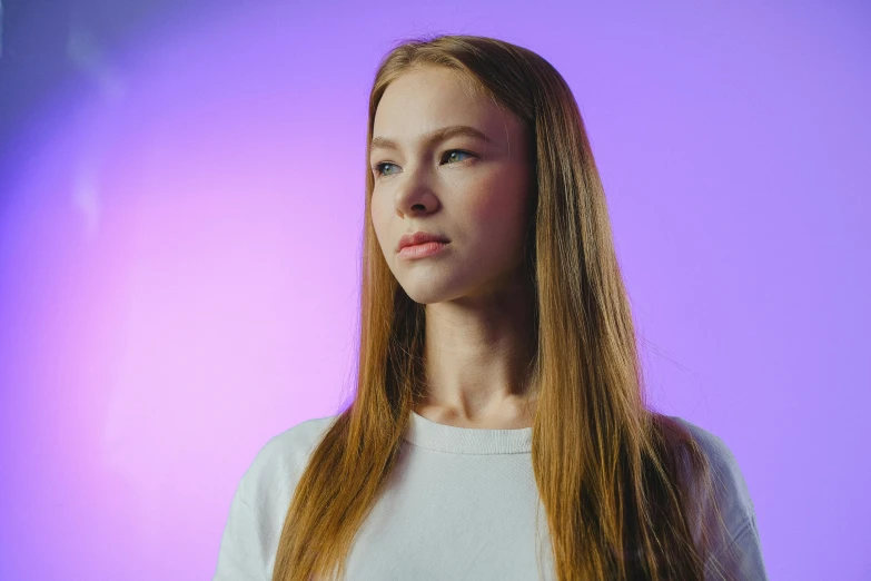 a woman standing in front of a purple background, trending on pexels, hyperrealism, light brown neat hair, portrait of a teen robot, cinematic soft lighting, young with long hair