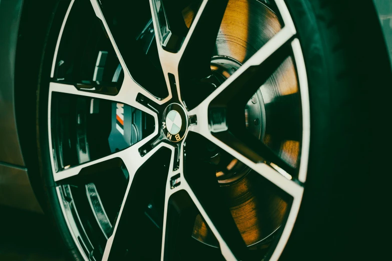 a close up of a wheel on a car, a digital rendering, pexels contest winner, instagram post, super high resolution, chrome and carbon, sportcar