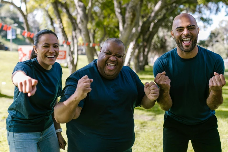 a group of three men standing next to each other, pexels contest winner, happening, all overly excited, an overweight, sydney park, wearing a tee shirt and combats