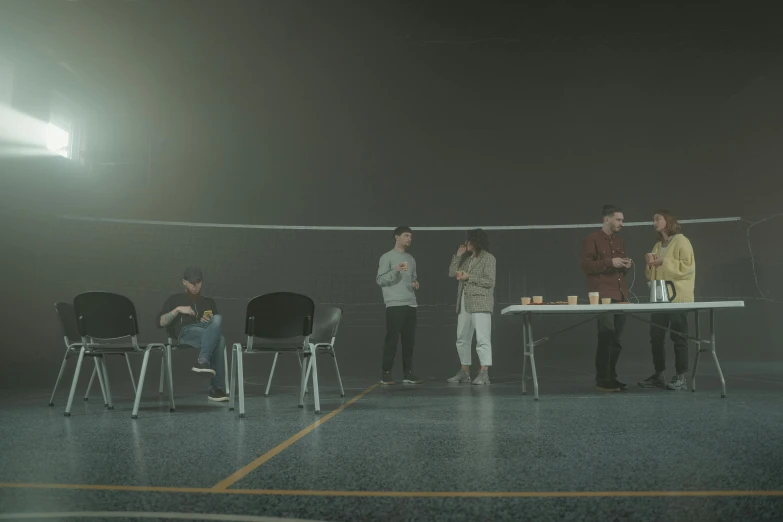 a group of people standing around a table, unsplash contest winner, hyperrealism, octane render. fog, volley court background, cutscene footage, ignant