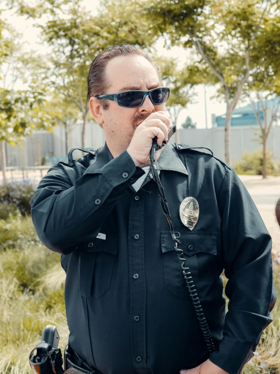 a man in a police uniform talking on a cell phone, doug walker, **cinematic, stylized photo, fan favorite