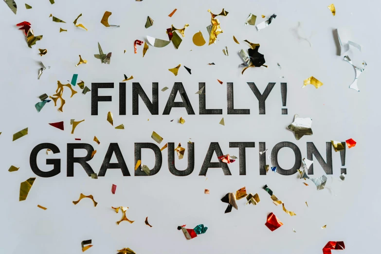a sign that says finally graduation surrounded by confetti, trending on unsplash, background image, evolution, fancy dress, completely empty