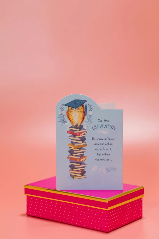 a card sitting on top of a stack of books, by Julia Pishtar, celebration, full card design, gradation, kenne gregoire