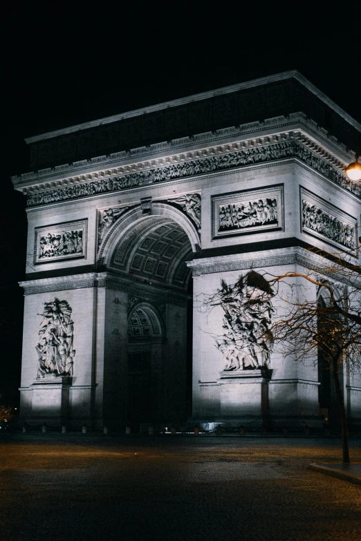 a black and white photo of the arc de trio triumph at night, a photo, pexels contest winner, neoclassicism, night color, square, late 2000’s, mysterious exterior