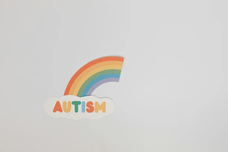 a sticker with the word autism on it, by Okuda Gensō, trending on pexels, on grey background, plain background, fullbody view, on white paper