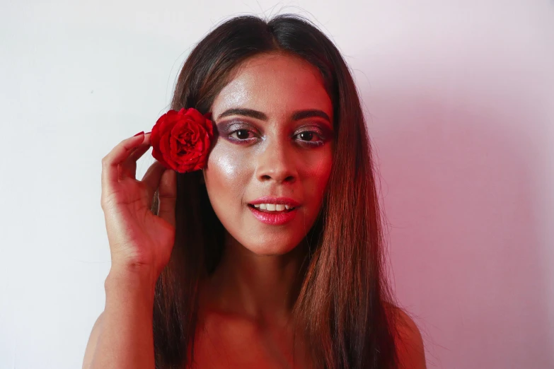 a woman with a rose in her hair, inspired by Natasha Tan, pexels contest winner, brown skin. light makeup, bright red, pose 4 of 1 6, pokimane