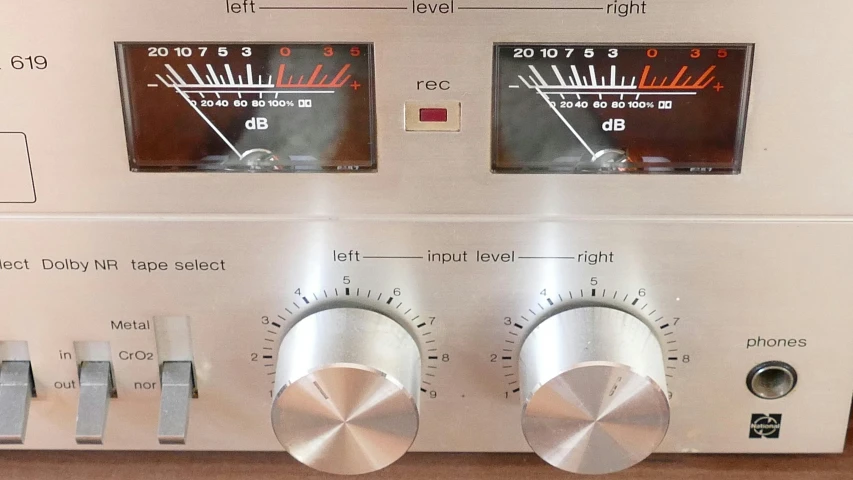 a close up of a control panel on a radio, an album cover, inspired by Robert Peak, unsplash, realism, 7 0 s hi fi system, brown, extremely clear and coherent, gauges