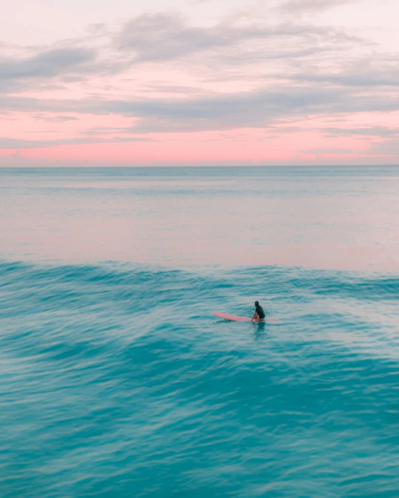 a man riding a wave on top of a surfboard, inspired by Elsa Bleda, unsplash contest winner, minimalism, pastel blues and pinks, panoramic view of girl, calm evening, pink and teal and orange