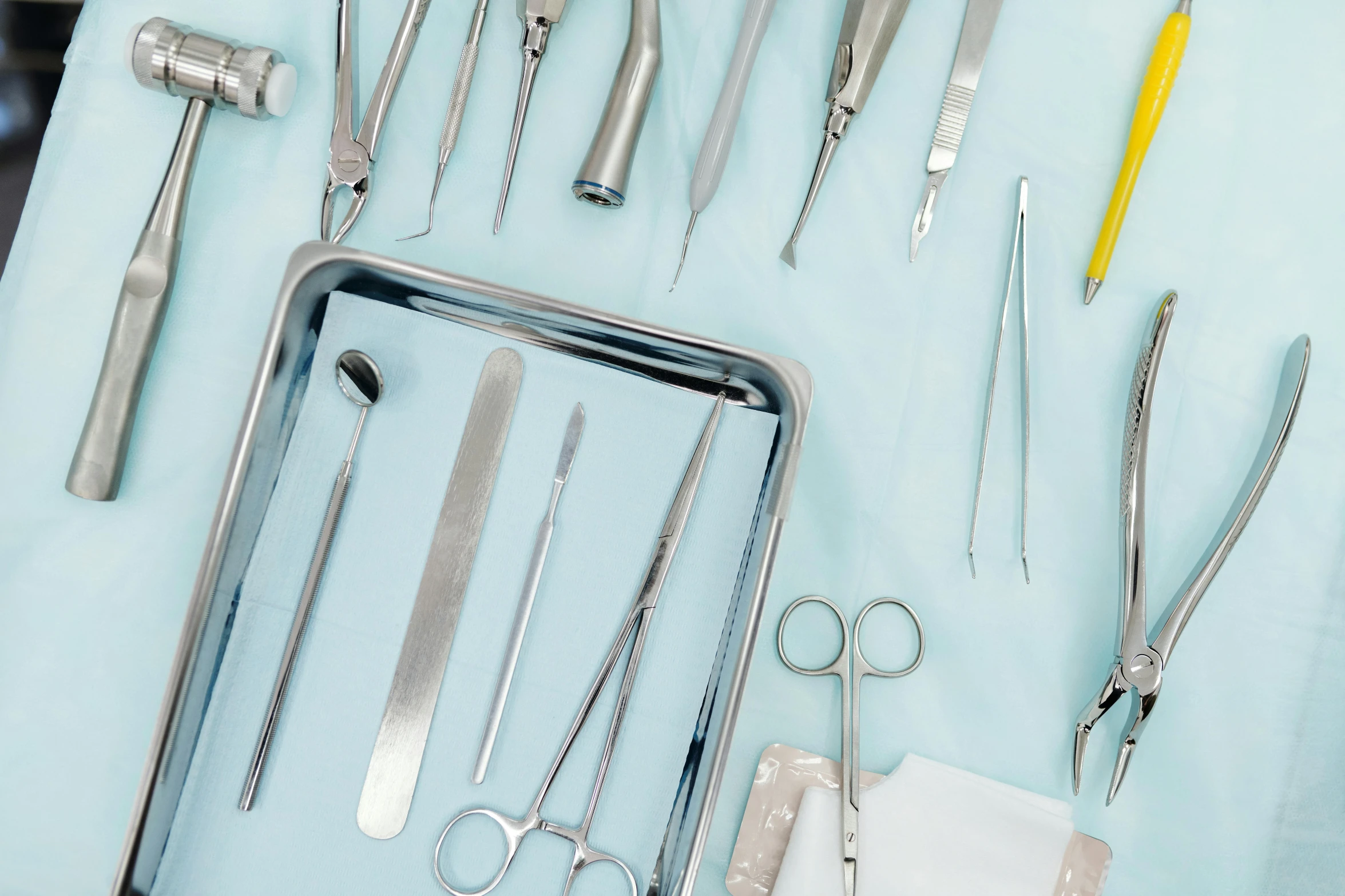 a bunch of tools sitting on top of a table, surgical impliments, profile image, rectangle, cleanest image