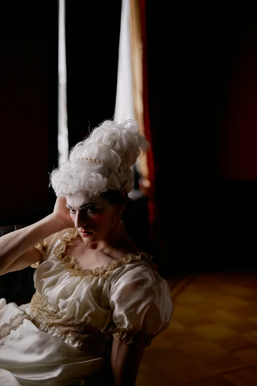 a woman in a white dress sitting on a chair, a portrait, inspired by Pietro Longhi, unsplash, rococo, live-action archival footage, frosting on head and shoulders, ( ( theatrical ) ), slide show