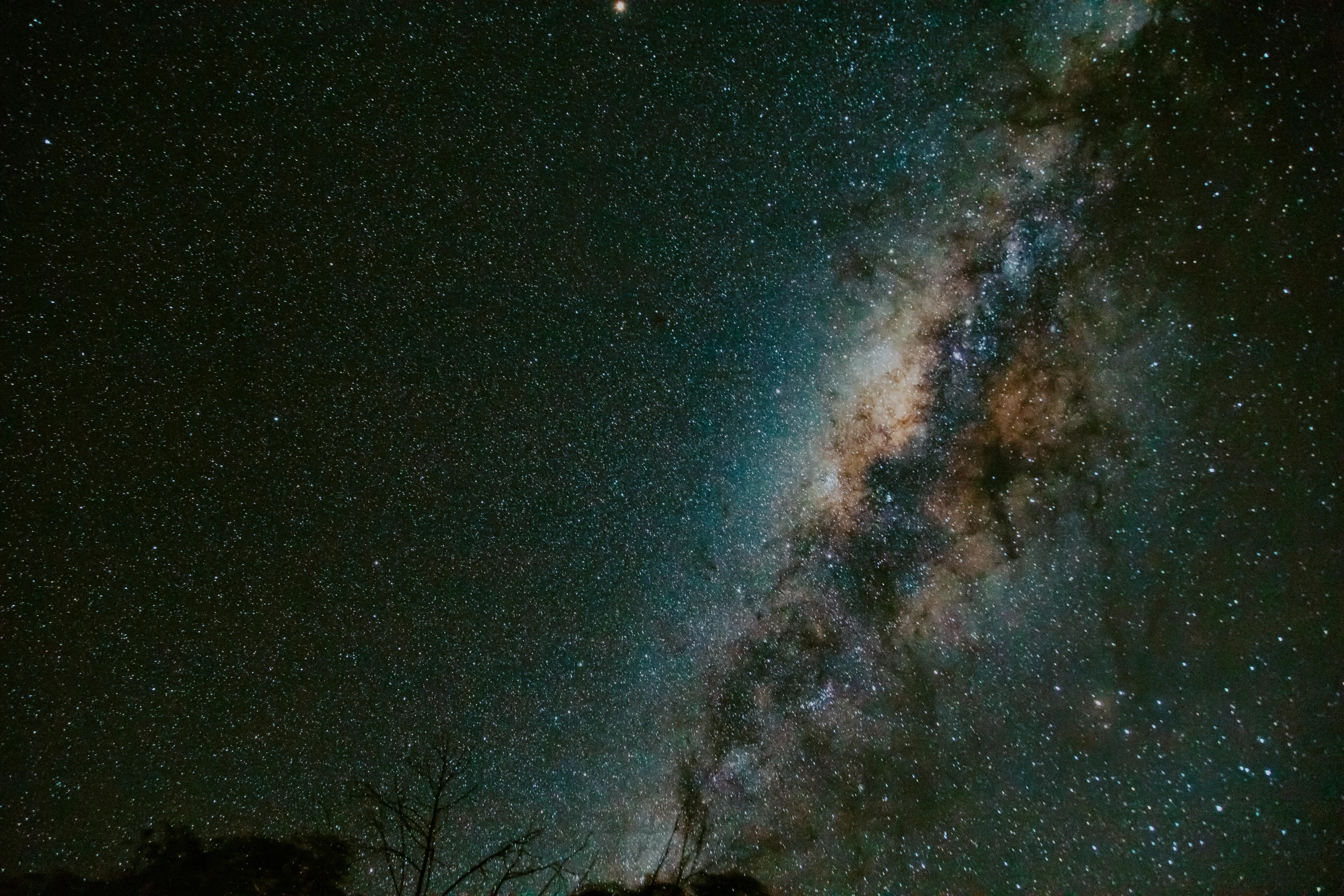 the milky shines brightly in the night sky, by Daniel Lieske, pexels contest winner, australian outback, middle close up, ash thorp, highly details