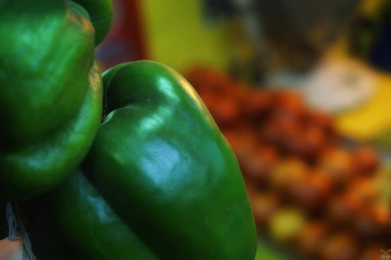 a bunch of green peppers sitting on top of a counter, pexels contest winner, close - up profile, chilean, fan favorite, wide screenshot