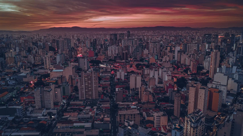 an aerial view of a city at sunset, inspired by Elsa Bleda, pexels contest winner, colombian, extreme panoramic, brazilian, vaporwave city