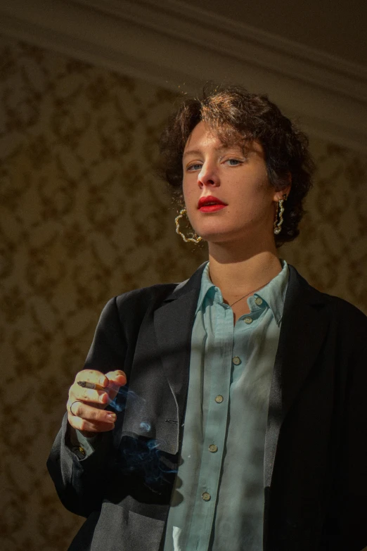 a woman standing in a room holding a wine glass, inspired by Nan Goldin, unsplash, hyperrealism, teal suit, finn wolfhard, while smoking a cigar, ( ( theatrical ) )