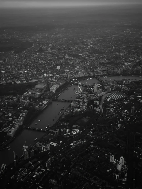 a black and white photo of a city, a black and white photo, by Sam Charles, in the air, river thames, cinematic view!!!, nika maisuradze