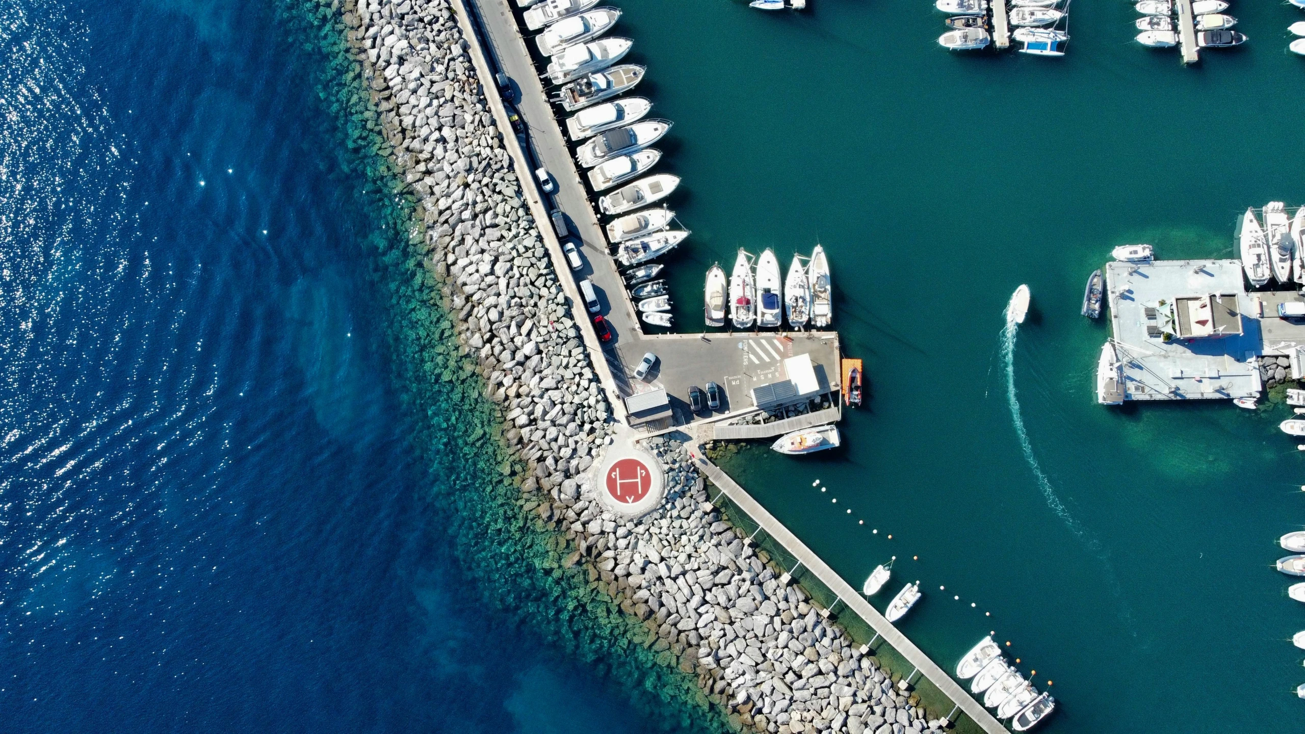 a marina filled with lots of white boats, a digital rendering, pexels contest winner, satellite view, 💋 💄 👠 👗, helipad, next to the sea