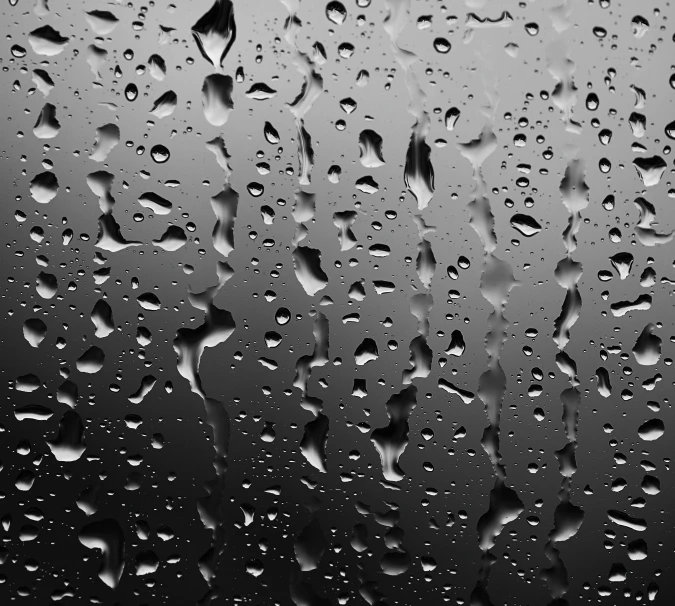 a black and white photo of raindrops on a window, by Jan Rustem, pexels, minimalism, liquid simulation background, background image, highly realistic bump map, high details photo