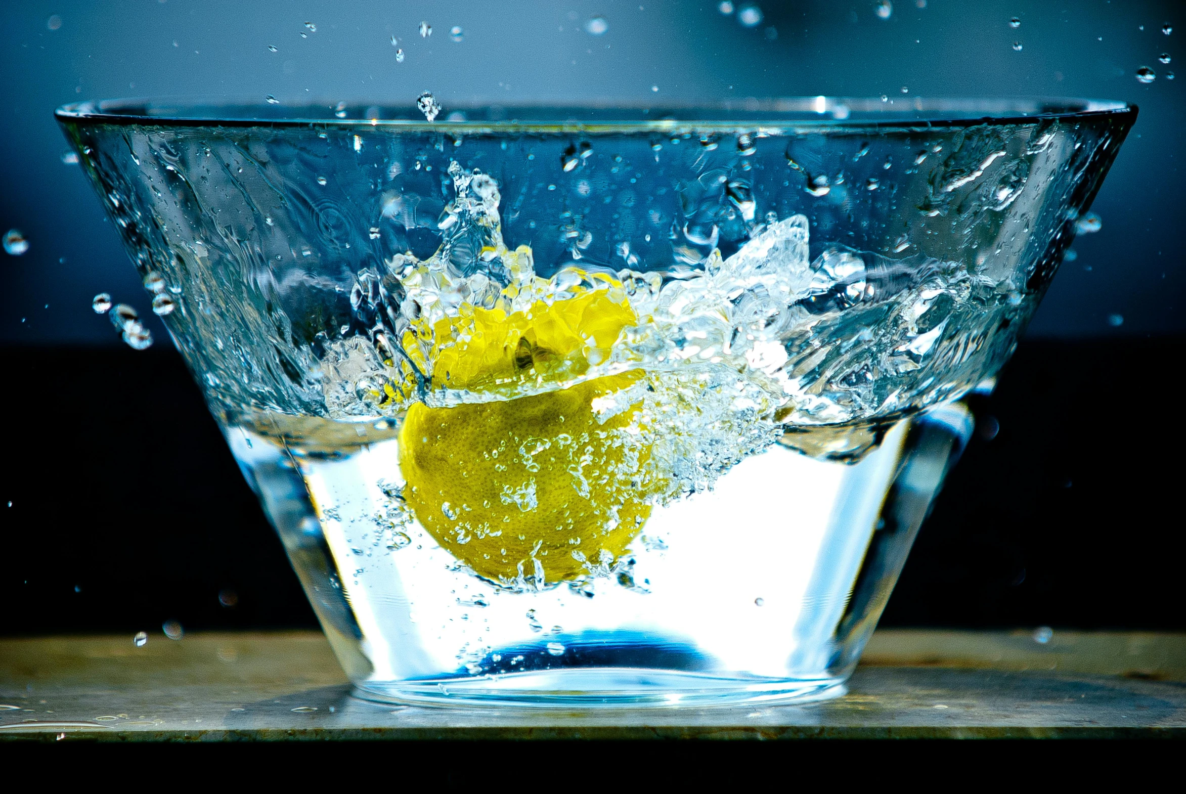 a glass of water with a lemon in it, by Ndoc Martini, unsplash, renaissance, square, splash image, molecular gastronomy, waist - up